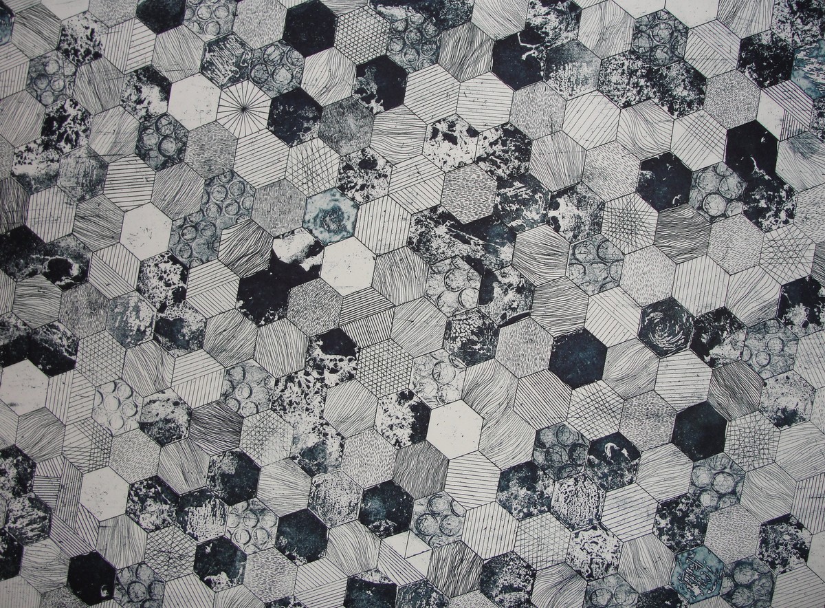 Gray and black hive printed textile